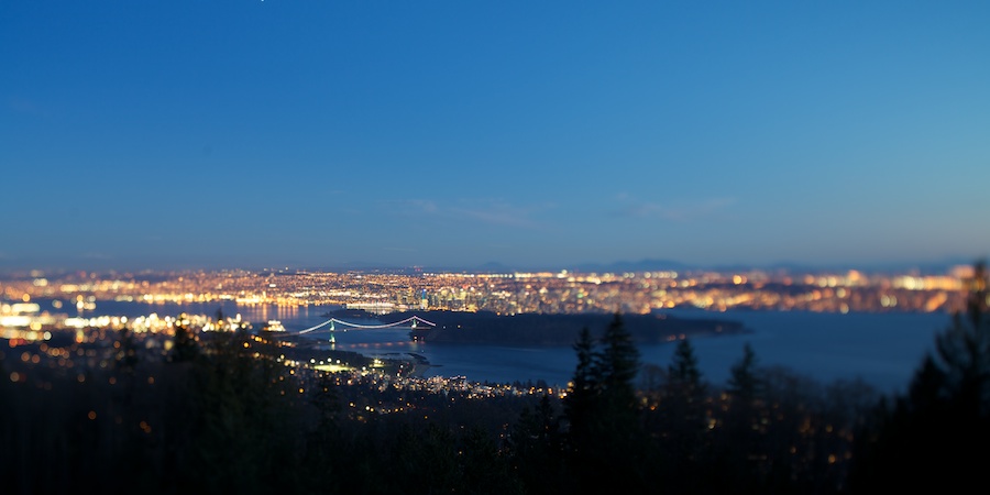 View of Vancouver lit up in evening glow. Cypress Mountain viewpoint, Vancouver, BC.