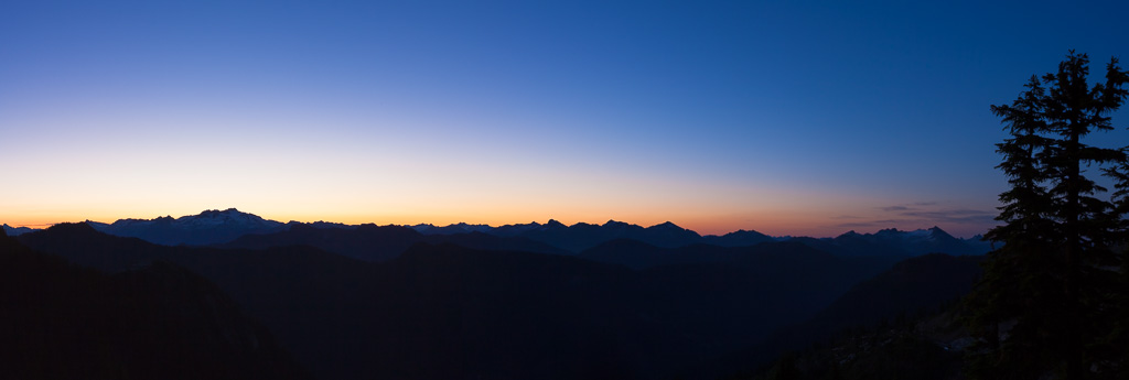 Sunrise from under the Sky Pilot mountain in Squamish, BC. Looking west over the Coast Mountain range, with Mamquam Mountain towering on the skyline